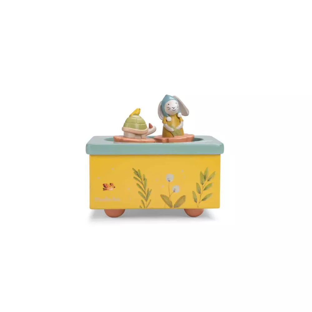 Carillon con Personaggi Moulin Roty Trois Petits Lapins di fronte