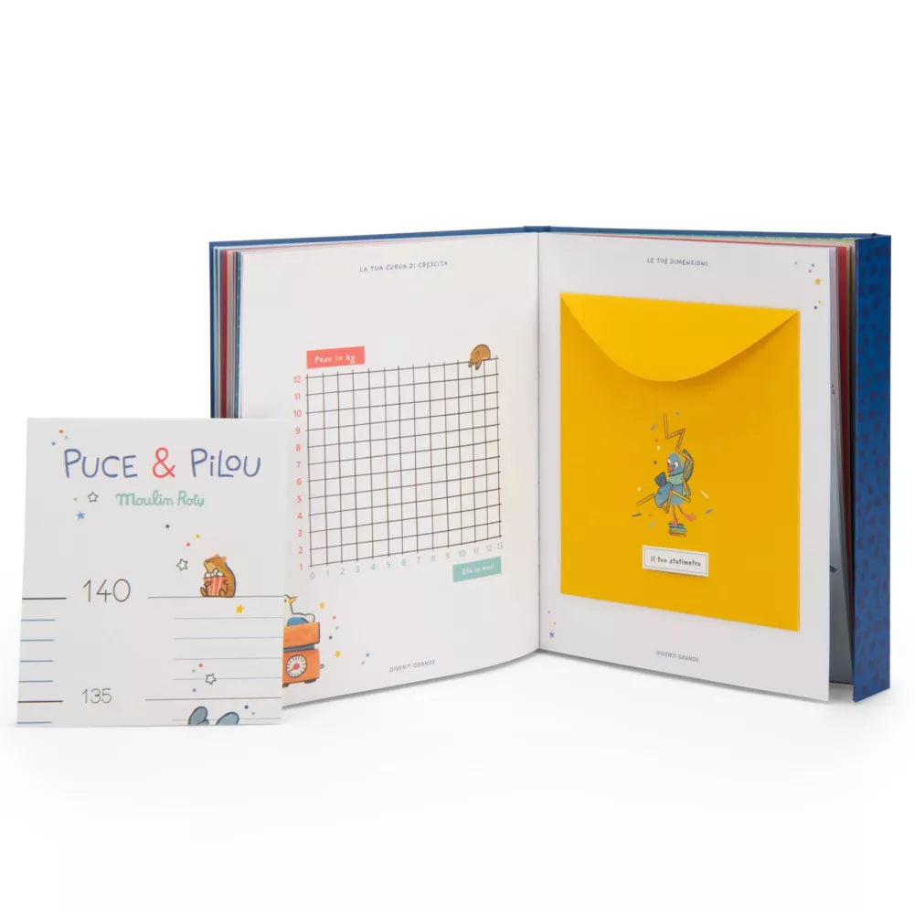Libro Nascita Puce & Pilou Moulin Roty aperto con metro pieghevole a fianco