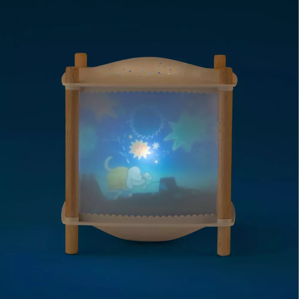 Lampada Revolution Moulin Roty Puce & Pilou accesa al buio