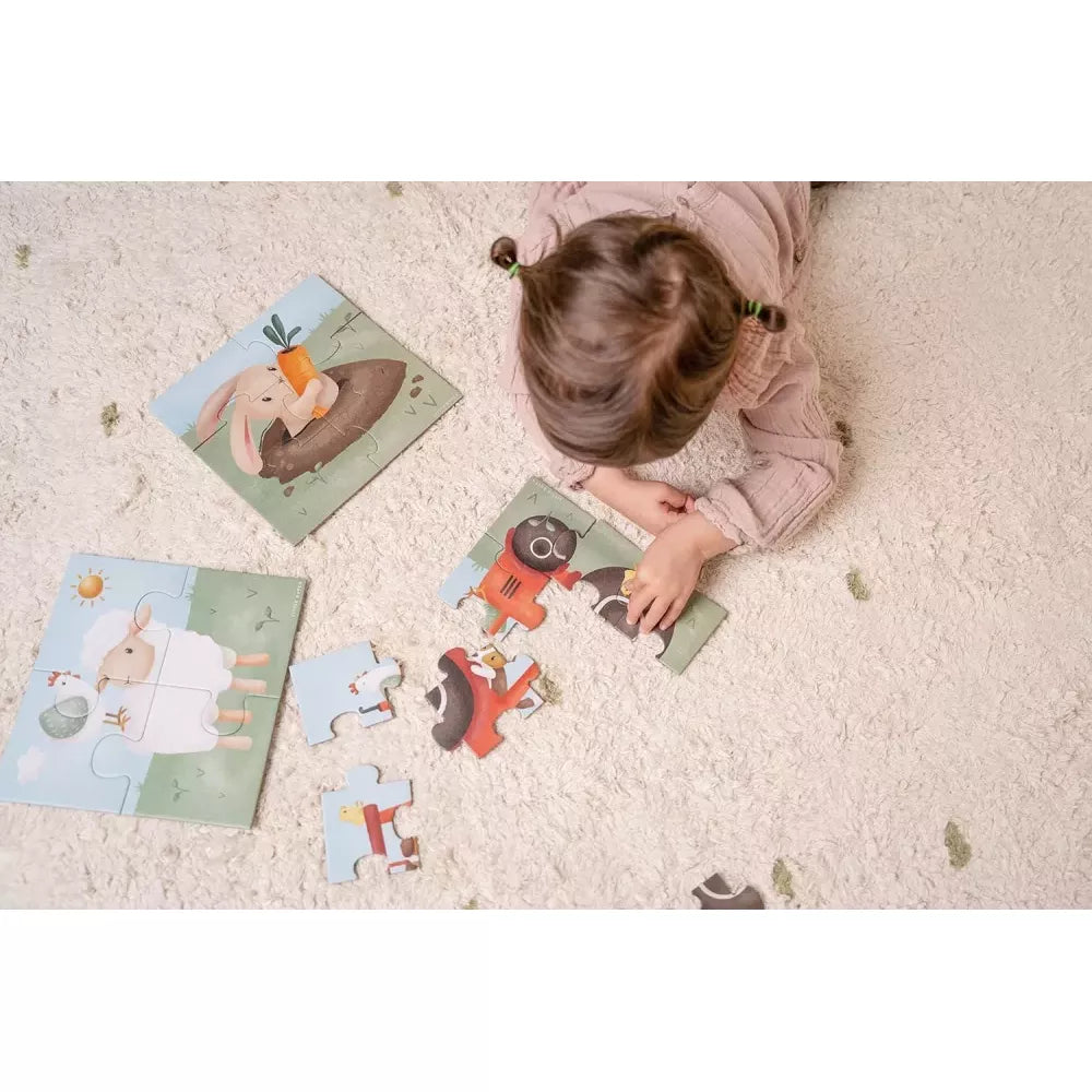 Puzzle 4 in 1 Little Dutch Little Farm bambina che monta il puzzle