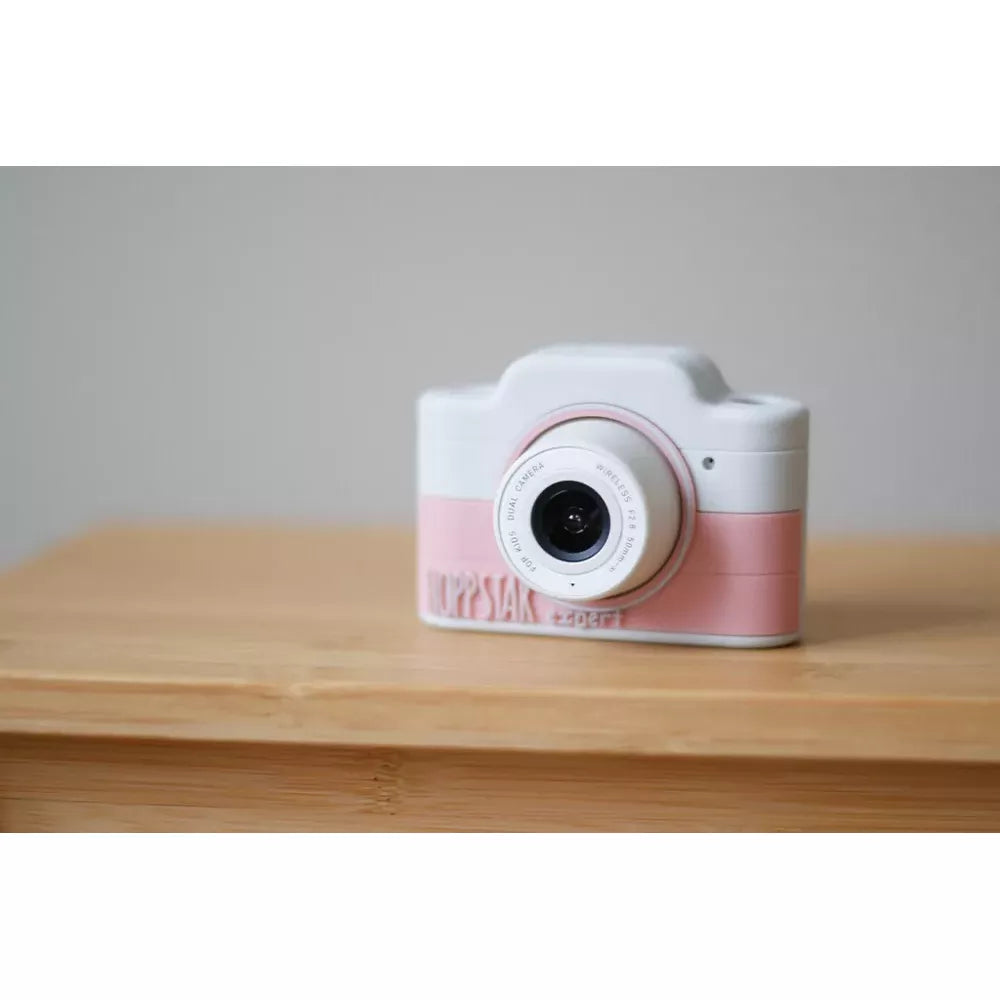 Fotocamera Expert Hoppstar Blush su un tavolo