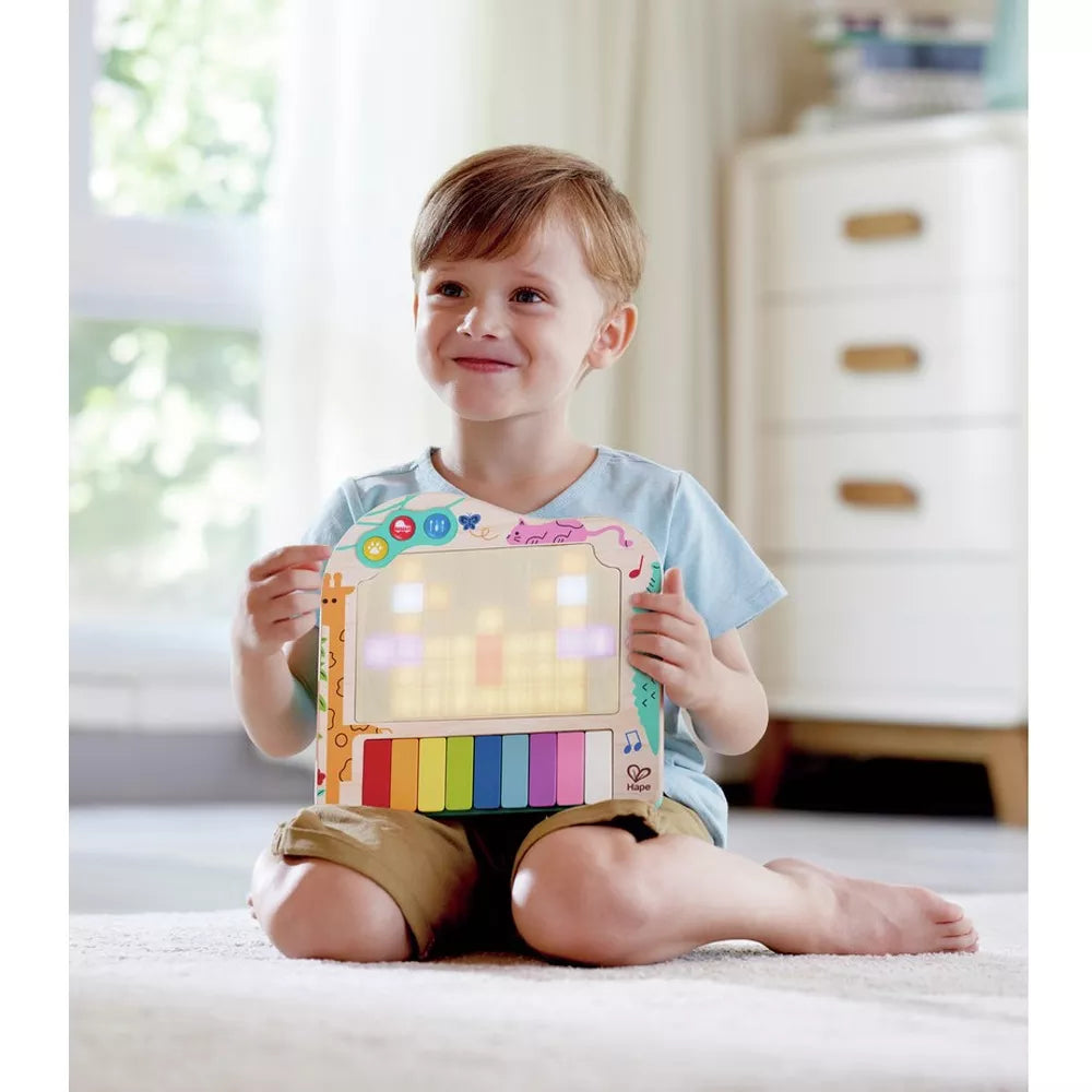 Bambino con il Pianoforte Pixel Luci e Suoni Hape