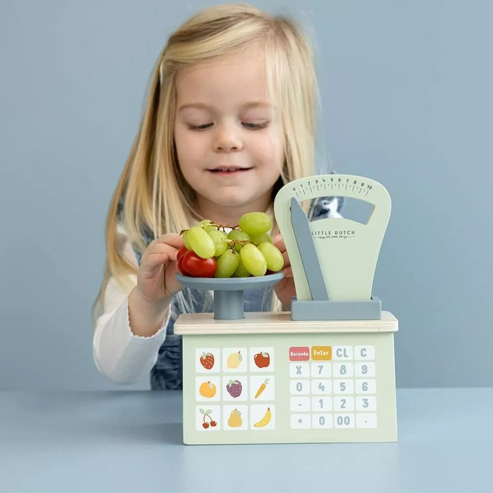 Bilancia Little Dutch con frutta sopra