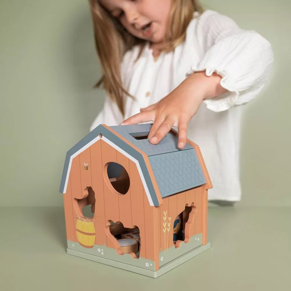 Scatola delle Forme Little Dutch Little Farm bambina che gioca