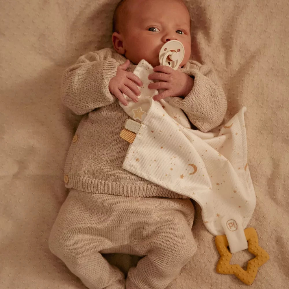 Bambino con Doudou con Dentinale a Stella Little Dutch